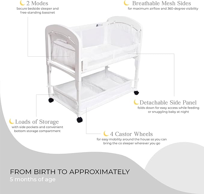 Arm’s Reach Cambria Co-Sleeper Bedside Bassinet Featuring Height-Adjustable Legs, Curved Wooden Ends, Breathable Mesh Sides with Pockets, and Large Lower Storage Basket, White