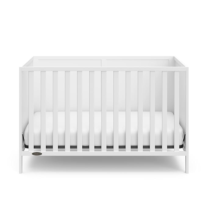 Graco Theo Crib and Mattress Nursery Essentials Pack (White) – GREENGUARD Gold Certified Baby Crib & Crib Mattress, Cribs with Mattress Included, Convertible Crib, Baby Mattresses for Crib