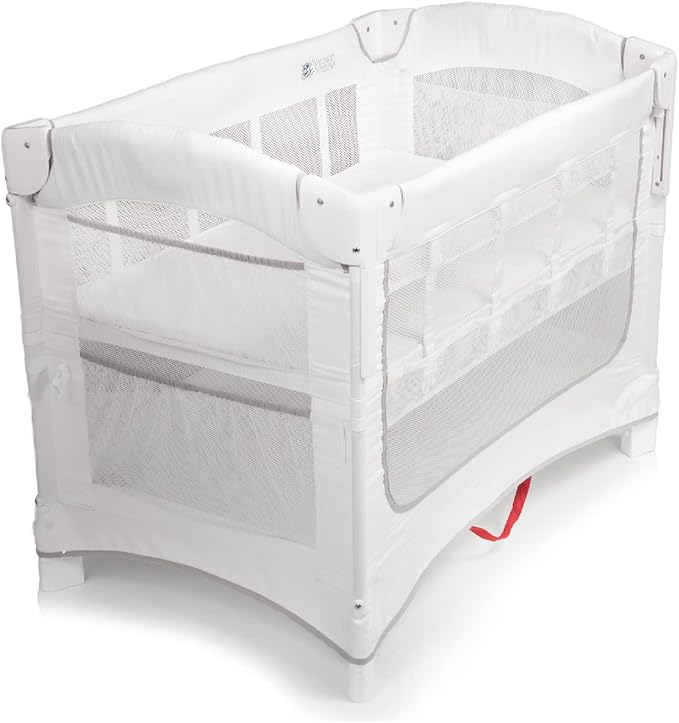 Arm’s Reach Ideal Ezee 3 in 1 Co-Sleeper Folding Bedside Bassinet and Play Yard Featuring Breathable Mesh Sides with Side Pockets for Storage and 4-Inch Sleeping Nest, White