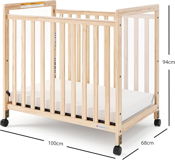 Foundations SafetyCraft Clearview Compact Daycare Crib, Durable Wood Construction, Non-Marking Casters (2 Locking), Includes 3” InfaPure Foam Mattress (Natural)