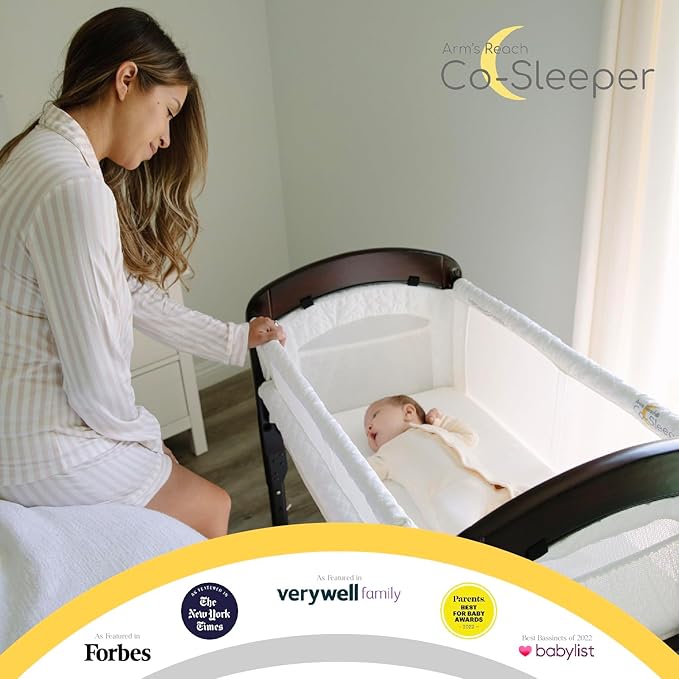 Arm’s Reach Cambria Co-Sleeper Bedside Bassinet Featuring Height-Adjustable Legs, Curved Wooden Ends, Breathable Mesh Sides with Pockets, and Large Lower Storage Basket, Espresso and White
