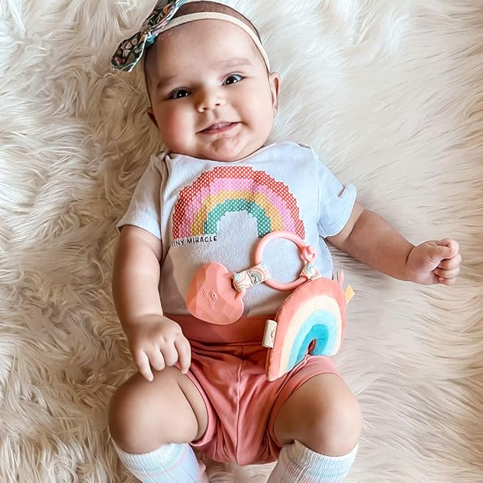 Itzy Ritzy Infant Toy & Teether - Itzy Pal Baby Teething Toy Includes Lovey, Crinkle Sound, Textured Ribbons & Silicone Teether for Newborn (Rainbow)