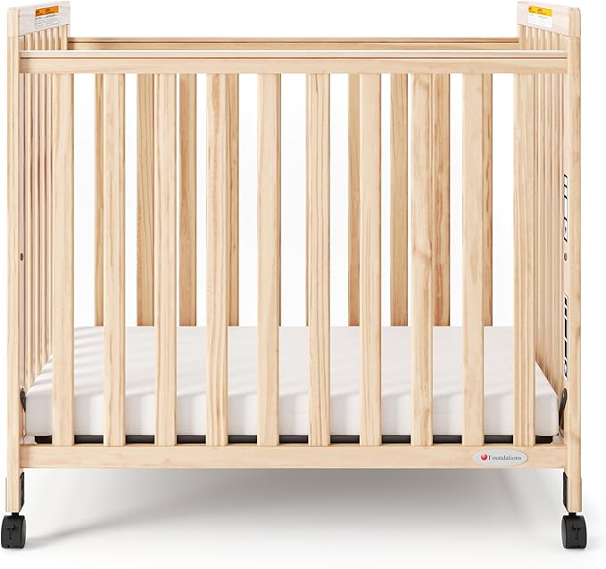 Foundations SafetyCraft Compact Slatted Daycare Crib, Durable Wood Construction, Non-Marking Casters (2 Locking), Includes 3” InfaPure Foam Mattress (Natural)