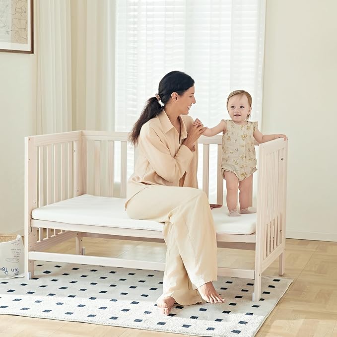 EvoNest Baby Crib, 6 in 1 Convertible Mini Crib with Wheels, 100% New Zealand Wood Growing Bed, 4 Adjustable Mattress Height, Washed Natural