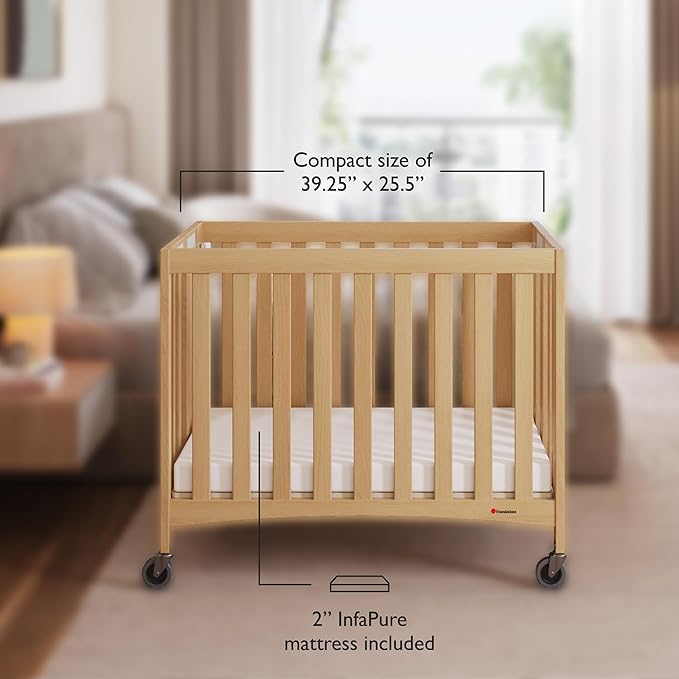 Foundations Travel Sleeper Wood Compact Folding Crib with 2” InfaPure Foam Crib Mattress and Commercial Grade Casters for Hotels (Natural)