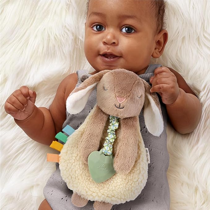 Itzy Ritzy - Itzy Lovey Including Teether - Baby Lovey with Teether, Textured Ribbons & Dangle Arms - Features Crinkle Sound, Sherpa Fabric and Minky Plush (Taupe Bunny)
