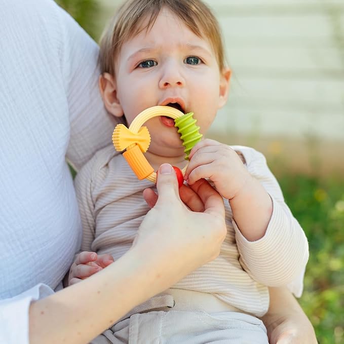 Nuby Pasta Ring Teether - Soft Silicone, Multi-Textured Surface, Easy Grip, Teething Relief for Babies 3+ Months