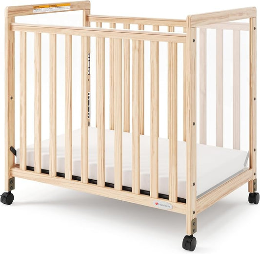 Foundations SafetyCraft Clearview Compact Daycare Crib, Durable Wood Construction, Non-Marking Casters (2 Locking), Includes 3” InfaPure Foam Mattress (Natural)