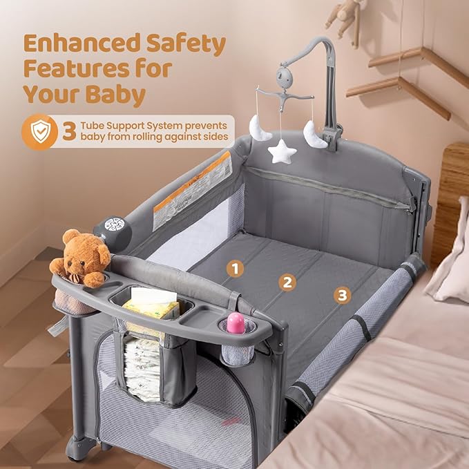 JOYMOR 9 in 1 Bedside Bassinet with Changing Table, Pack and Play with Bassinet, Convert to Rocking Baby Bed with Electric Music Center, Mosquito Net, Toy, Storage, Gray
