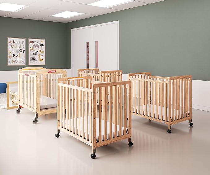 Foundations SafetyCraft Compact Slatted Daycare Crib, Durable Wood Construction, Non-Marking Casters (2 Locking), Includes 3” InfaPure Foam Mattress (Natural)