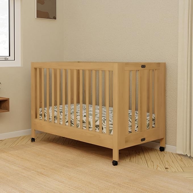 babyletto Maki 2-in-1 Portable Folding Crib with Toddler Bed Conversion Kit in Honey, Greenguard Gold Certified