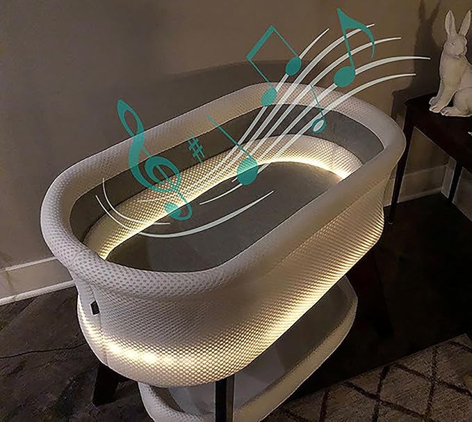 Evi Smart Baby Bassinet Beside Sleeper with Auto-Glide, Ambient Nightlight & Sensory Sounds, Compatible with Alexa and Google Home, Includes 2 Sheets (White W/White Legs)