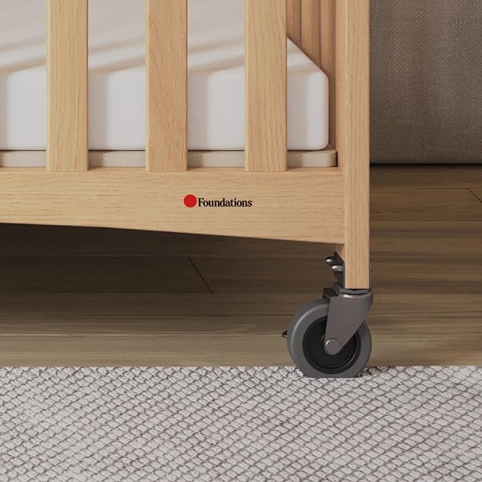 Foundations Travel Sleeper Full-Size Wooden Folding Crib with 3” InfaPure Foam Mattress and Commercial Grade Casters, Hotel Crib (Natural)