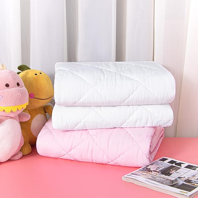 NTBAY Down Alternative Oversized Toddler Comforter, Super Soft and Warm Solid Color Baby Crib Quilted Blanket, 43x60 inches, Pink