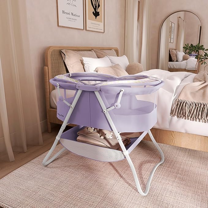 Dream On Me Karley Bassinet in Periwinkle, Lightweight Portable Baby Bassinet, Quick Fold and Easy to Carry , Adjustable Double Canopy, Indoor and Outdoor Bassinet with Large Storage Basket.