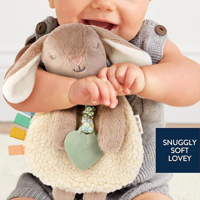 Itzy Ritzy - Itzy Lovey Including Teether - Baby Lovey with Teether, Textured Ribbons & Dangle Arms - Features Crinkle Sound, Sherpa Fabric and Minky Plush (Taupe Bunny)
