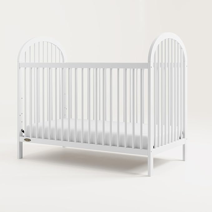 Graco Olivia Convertible Crib (White) – GREENGUARD Gold Certified, 100% Solid Wood, Fits Standard Crib Mattress, Converts to Toddler Bed and Daybed, 4 Adjustable Mattress Heights