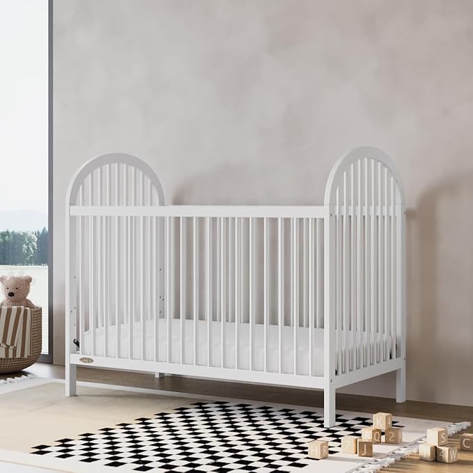 Graco Olivia Convertible Crib (White) – GREENGUARD Gold Certified, 100% Solid Wood, Fits Standard Crib Mattress, Converts to Toddler Bed and Daybed, 4 Adjustable Mattress Heights