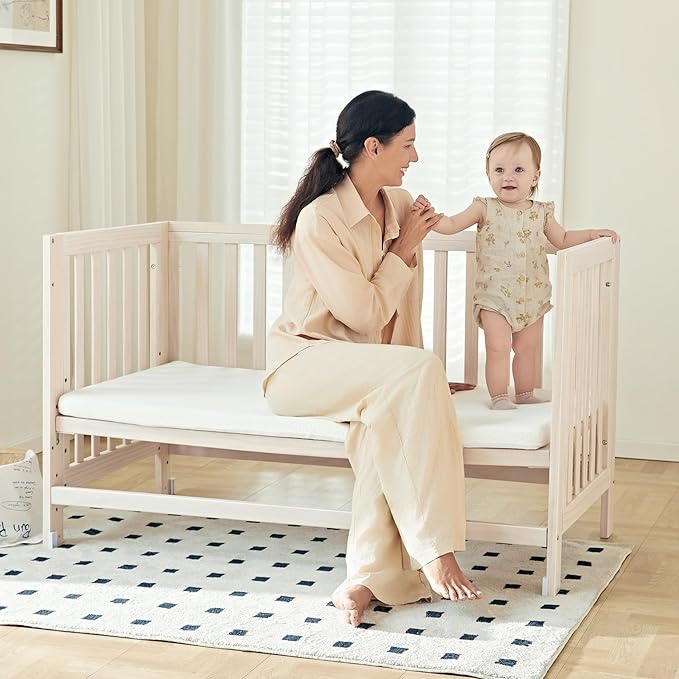 EvoNest Baby Crib, 11 in 1 Convertible Crib with Wheels, 100% New Zealand Wood Growing Bed, 4 Adjustable Mattress Height,Washed Natural