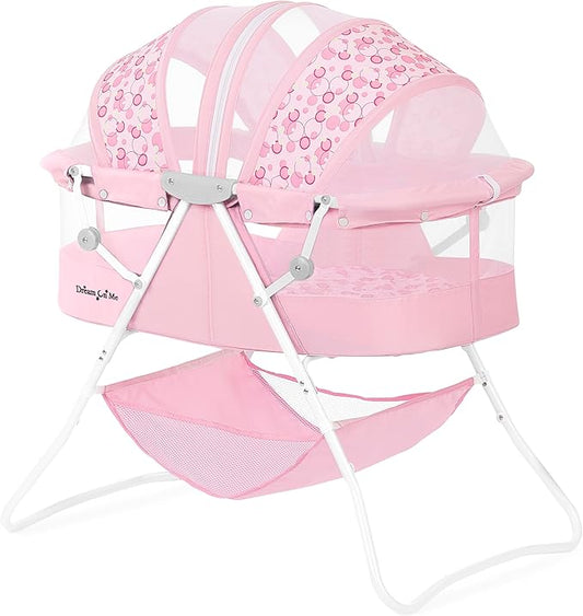 Dream On Me Karley Bassinet in Pink, Lightweight Portable Baby Bassinet, Quick Fold and Easy to Carry, Adjustable Double Canopy, Indoor and Outdoor Bassinet with Large Storage Basket.