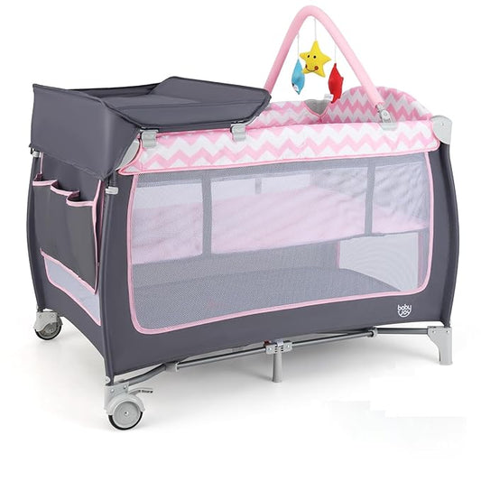 BABY JOY 4 in 1 Pack and Play, Portable Baby Playard with Bassinet, Side Zipper Door, Changing Table, Indoor Outdoor Travel Nursery Center w/Toy Bar, Lockable Wheels, Carry Bag