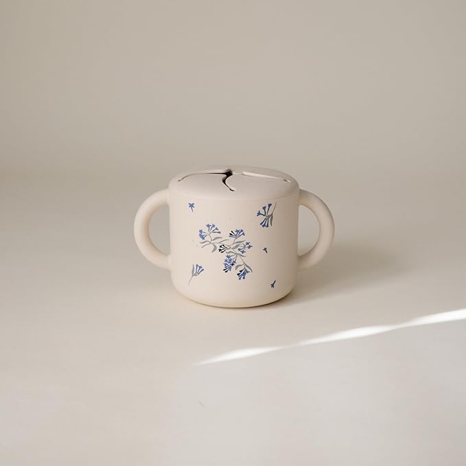 mushie Silicone Snack Cup | Spill Proof Food Container for Toddler and Baby (Lilac Flowers)