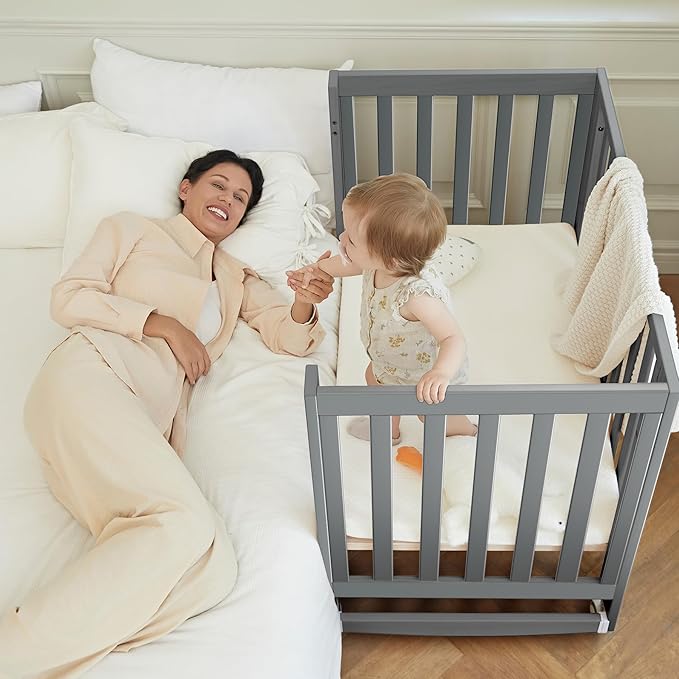 EvoNest Baby Crib, 6 in 1 Convertible Mini Crib with Wheels, 100% New Zealand Wood Growing Bed, 4 Adjustable Mattress Height，Grey
