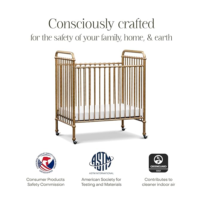 NAMESAKE Abigail 3-in-1 Portable Baby Crib with Wheels - GREENGUARD Gold Certified Convertible Crib to Toddler Bed & Daybed - Metal Baby Bed w/ 4 Adjustable Mattress Heights, for Small Spaces - Gold