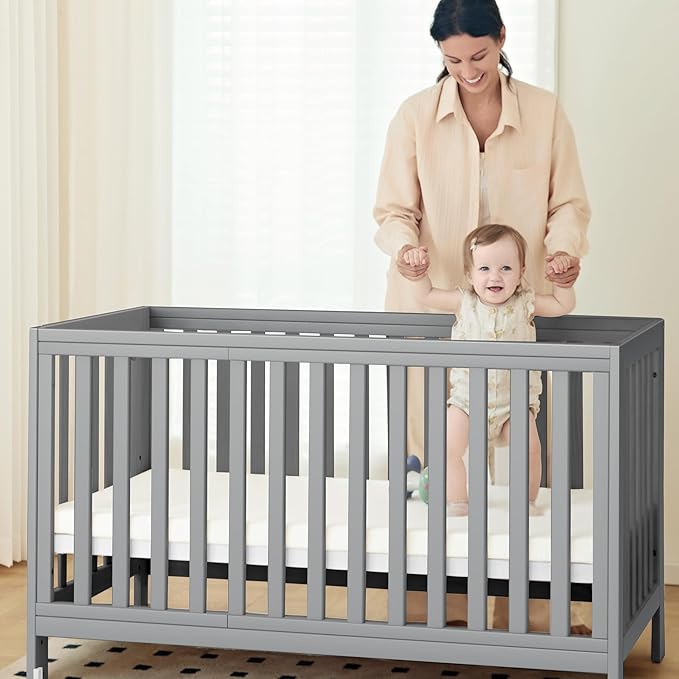 EvoNest Baby Crib, 6 in 1 Convertible Mini Crib with Wheels, 100% New Zealand Wood Growing Bed, 4 Adjustable Mattress Height，Grey