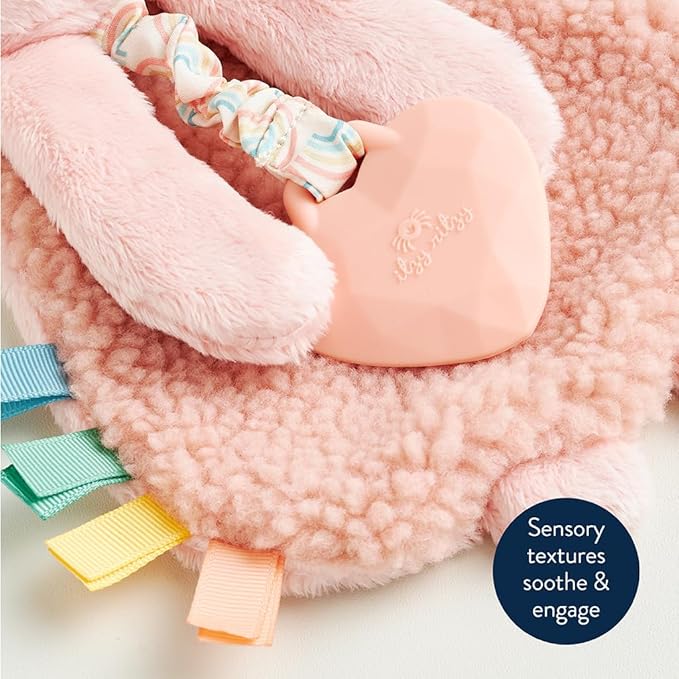 Itzy Ritzy - Itzy Lovey Including Teether - Baby Lovey with Teether, Textured Ribbons & Dangle Arms - Features Crinkle Sound, Sherpa Fabric and Minky Plush (Pink Bunny)