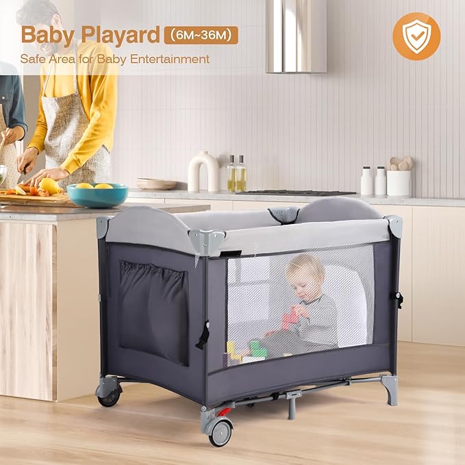 JOYMOR 4 in 1 Pack and Play, Baby Bedside Bassinet, Sturdy Play Yard with Padded Mat and Toy bar with Soft Toys
