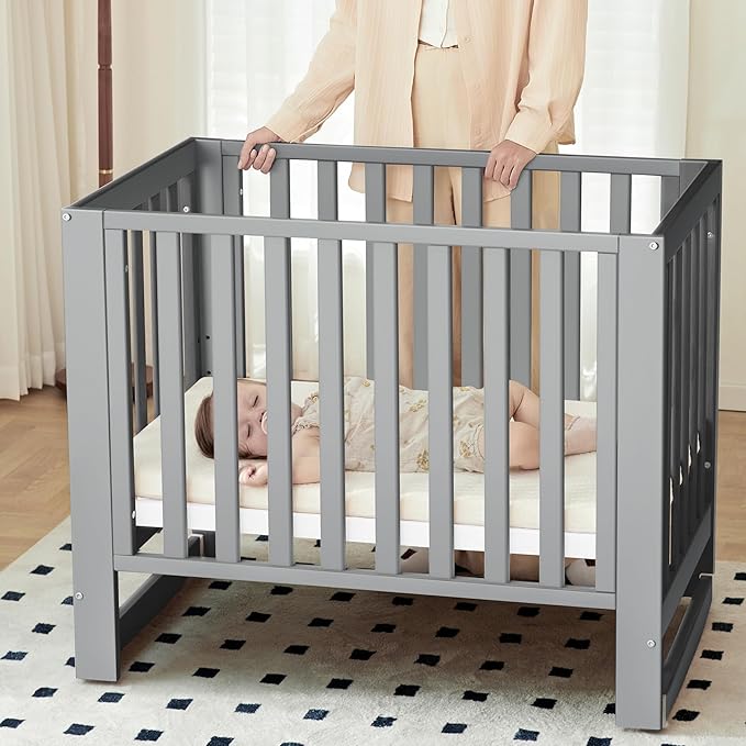 EvoNest Baby Crib, 6 in 1 Convertible Mini Crib with Wheels, 100% New Zealand Wood Growing Bed, 4 Adjustable Mattress Height，Grey