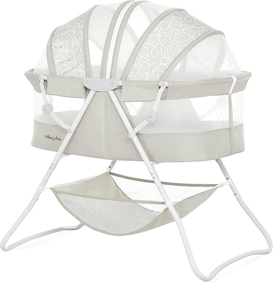 Dream On Me Karley Bassinet in Cool Grey, Lightweight Portable Baby Bassinet, Quick Fold and Easy to Carry , Adjustable Double Canopy, Indoor and Outdoor Bassinet with Large Storage Basket.