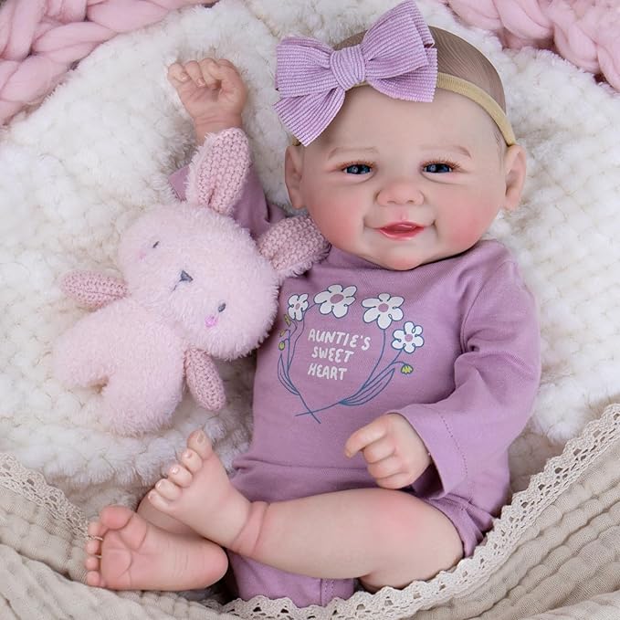 Aori Lifelike Reborn Baby Dolls - 20 Inch Realistic Smiling Girl Newborn Baby Doll with Weighted Body for Cuddling Poseable Soft Vinyl Limbs with Purple Outfit Set for Kids 3+ Role Play