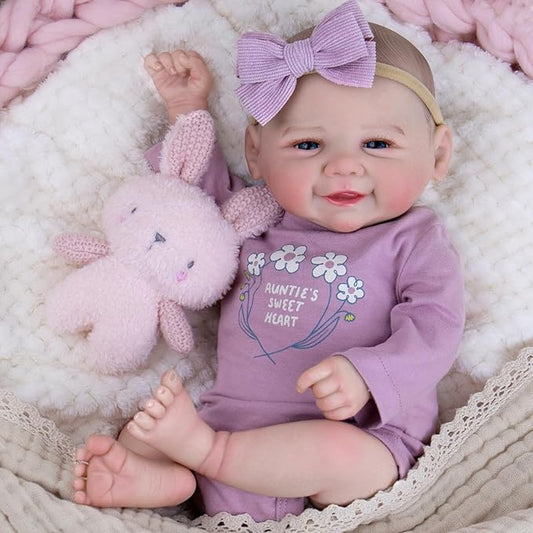 Aori Lifelike Reborn Baby Dolls - 20 Inch Realistic Smiling Girl Newborn Baby Doll with Weighted Body for Cuddling Poseable Soft Vinyl Limbs with Purple Outfit Set for Kids 3+ Role Play