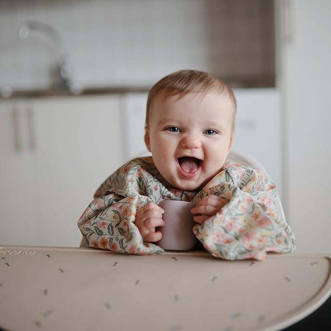 mushie Long Sleeve Baby Bib | Water Resistant Adjustable Fit for Ages 6-24 Months