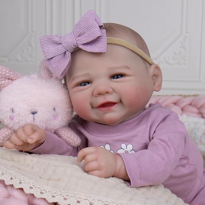 Aori Lifelike Reborn Baby Dolls - 20 Inch Realistic Smiling Girl Newborn Baby Doll with Weighted Body for Cuddling Poseable Soft Vinyl Limbs with Purple Outfit Set for Kids 3+ Role Play