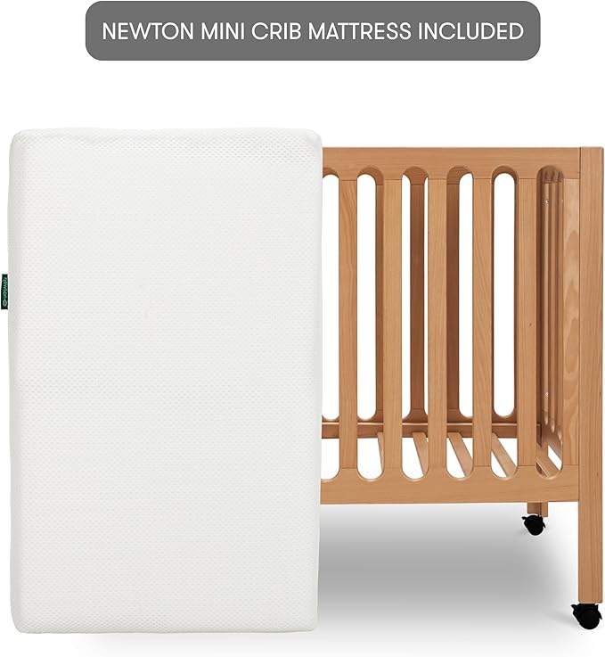 Newton Baby Galileo Mini Crib Solid Beech Wood with Wheels in Chestnut Color, Mini Crib Mattress Included, Adjustable Mattress Height, Ultra-Safe Non-Toxic Finish