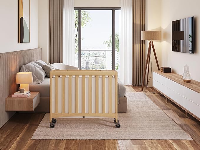 Foundations Travel Sleeper Wood Compact Folding Crib with 2” InfaPure Foam Crib Mattress and Commercial Grade Casters for Hotels (Natural)
