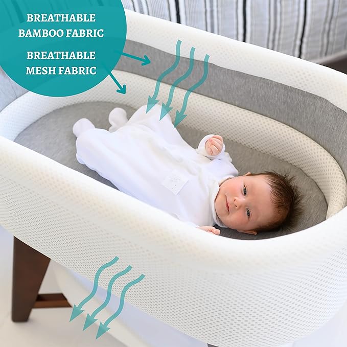 Evi Smart Baby Bassinet Beside Sleeper with Auto-Glide, Ambient Nightlight & Sensory Sounds, Compatible with Alexa and Google Home, Includes 2 Sheets (Soft White W/Natural Legs)