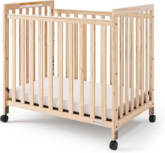 Foundations SafetyCraft Compact Slatted Daycare Crib, Durable Wood Construction, Non-Marking Casters (2 Locking), Includes 3” InfaPure Foam Mattress (Natural)