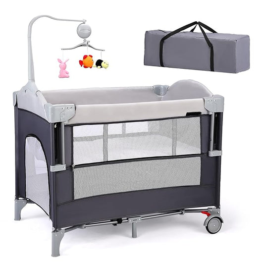 JOYMOR 4 in 1 Pack and Play, Baby Bedside Bassinet, Sturdy Play Yard with Padded Mat and Toy bar with Soft Toys