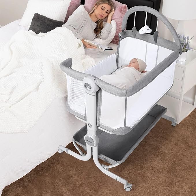 Cowiewie Baby Bassinet Bedside Sleeper with Storage Basket,Wheels & Hanging Toys, Easy Folding Portable Bassinet with Wheels Adjustable Height Portable Bassinets for Newborn(Handbag)