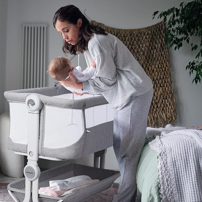 Cowiewie Baby Bassinet Bedside Sleeper with Storage Basket,Wheels & Hanging Toys, Easy Folding Portable Bassinet with Wheels Adjustable Height Portable Bassinets for Newborn(Handbag)