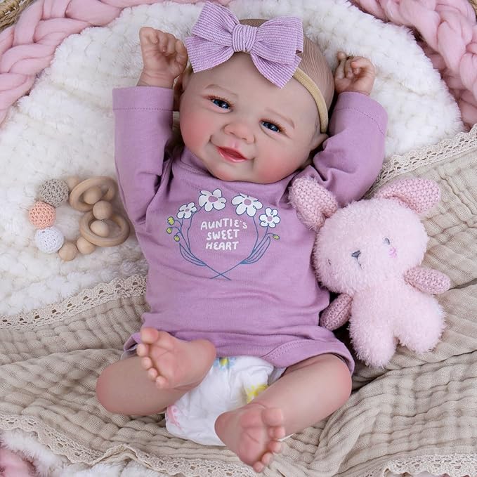 Aori Lifelike Reborn Baby Dolls - 20 Inch Realistic Smiling Girl Newborn Baby Doll with Weighted Body for Cuddling Poseable Soft Vinyl Limbs with Purple Outfit Set for Kids 3+ Role Play