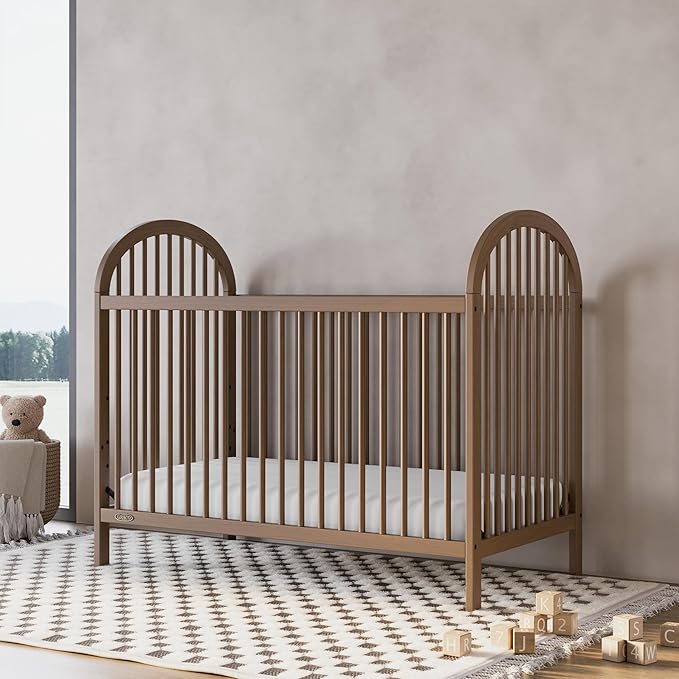 Graco Olivia Convertible Crib (Hazelnut) – GREENGUARD Gold Certified, 100% Solid Wood, Fits Standard Crib Mattress, Converts to Toddler Bed and Daybed, 4 Adjustable Mattress Heights