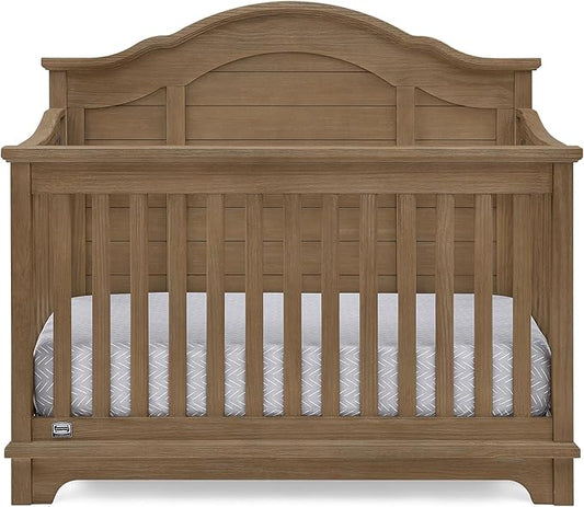 Delta Children Simmons Kids Asher 6-in-1 Convertible Crib with Toddler Rail, Aged Oak