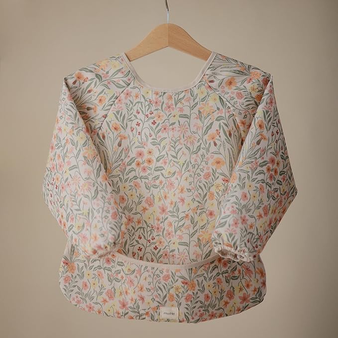 mushie Long Sleeve Baby Bib | Water Resistant Adjustable Fit for Ages 6-24 Months