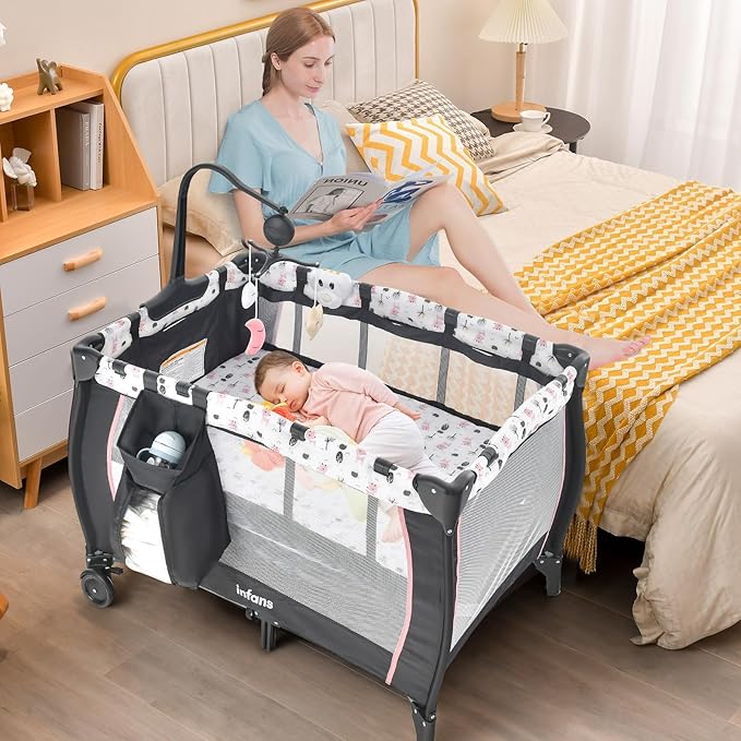 INFANS 3 in 1 Pack and Play, Portable Travel Baby Crib Bassinet with Detachable Mattress, Newborn Changing Table, Foldable Playpen with Carry Bag and 2 Wheels (Cartoon)