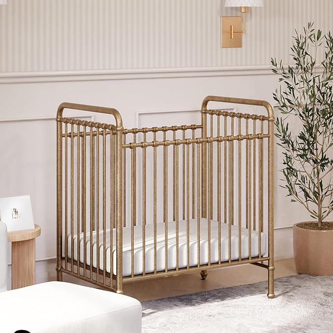NAMESAKE Abigail 3-in-1 Portable Baby Crib with Wheels - GREENGUARD Gold Certified Convertible Crib to Toddler Bed & Daybed - Metal Baby Bed w/ 4 Adjustable Mattress Heights, for Small Spaces - Gold